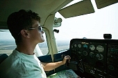 pilot, pilot cabin, airplane, plane, flying, aeroplane, aircraft, can, control panel, dash panel, dashboard, instrument board, instrument panel, index, indicator, needle, pointer, sample, table, clock, wheel, joystick, rod control, private-aeroplane, private-airplane, private-plane, private-can, smile, sunglasses, man, people, job, transportation, sport, spare-time, leisure, time, map, high, loftily, on plane, by plane, by air, to fly, to flew, flown, screw, propeller, CD 0029, Kiss Lszl, Lszl Kiss
