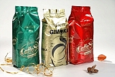 coffee, coffee box, packet, packing, household, drink, ribbon, cup, spoon, spoons, metal, metallic, aluminium, shiny, glass, crome, nickel, stainless, bitter, uscious, sweet, balmy, fragrant, redolent, steamy, reeking, blink, gleam, vacuum, packed, instant, gold, silver, gran, granulated, coffee color, drab, brown, milk, white coffee, coffee beans, Kiss Lszl, Lszl Kiss