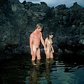 nudism, naturist couple, reflection, naturism, nudist, naturist, nudist man, nudist couple, nudist pair, bathe, bathing, naturist man, nudist women, naked couple, naturist woman, naked, stripped, rock coast, happiness, delight, laughing, laugh, lymph, cristal clean, holidays, on holiday, recreation, relaxation, repose, rest, game, attitude, pose, posture, stony, craggy, bay, gulf, clear, hygienic, pure, clean, Hawaii, Kona, Honokohau, Queen s bath, 1987, man, woman, bath, bath, water, stone, stones, rock, scrag, bush, CD 0090