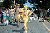 naturist participiant, naturist group, yellow painting, naturist programme, women, gents, men, naked, stripped, programme, San Francisco, ING Bay to breakers, every year, above age limit, naturists, body painting, running, special feeling, Gviulan, nude runner, hello, backpack, knapsack, rucksack, nude man, chirpy, unswagged pair, strange pair, pair, muscular, handsome man, sunglasses, little black dress, CD 0072, to splurge