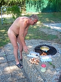 naturist, naturism, man, to cook, Balatonakali, Delegyhaza, Hungary, fkk, nudist, scrambled eggs, lunch, food, encampment, camping, fire, CD 0037